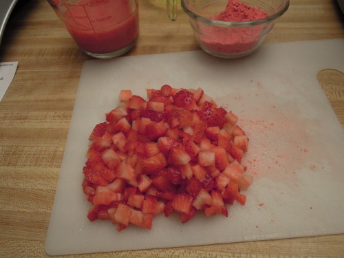 Three forms of strawberry--puree, diced, and powder. 